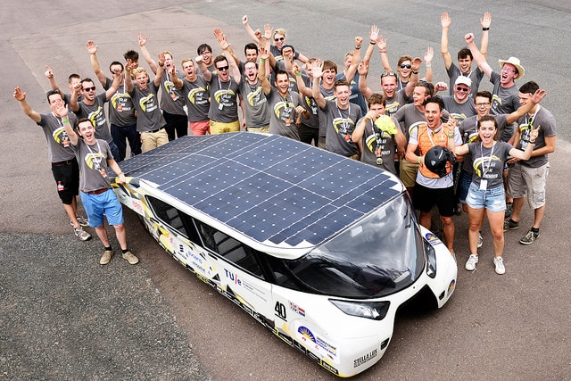 the whole team of solar team eindhoven in australia with their solar car stella lux